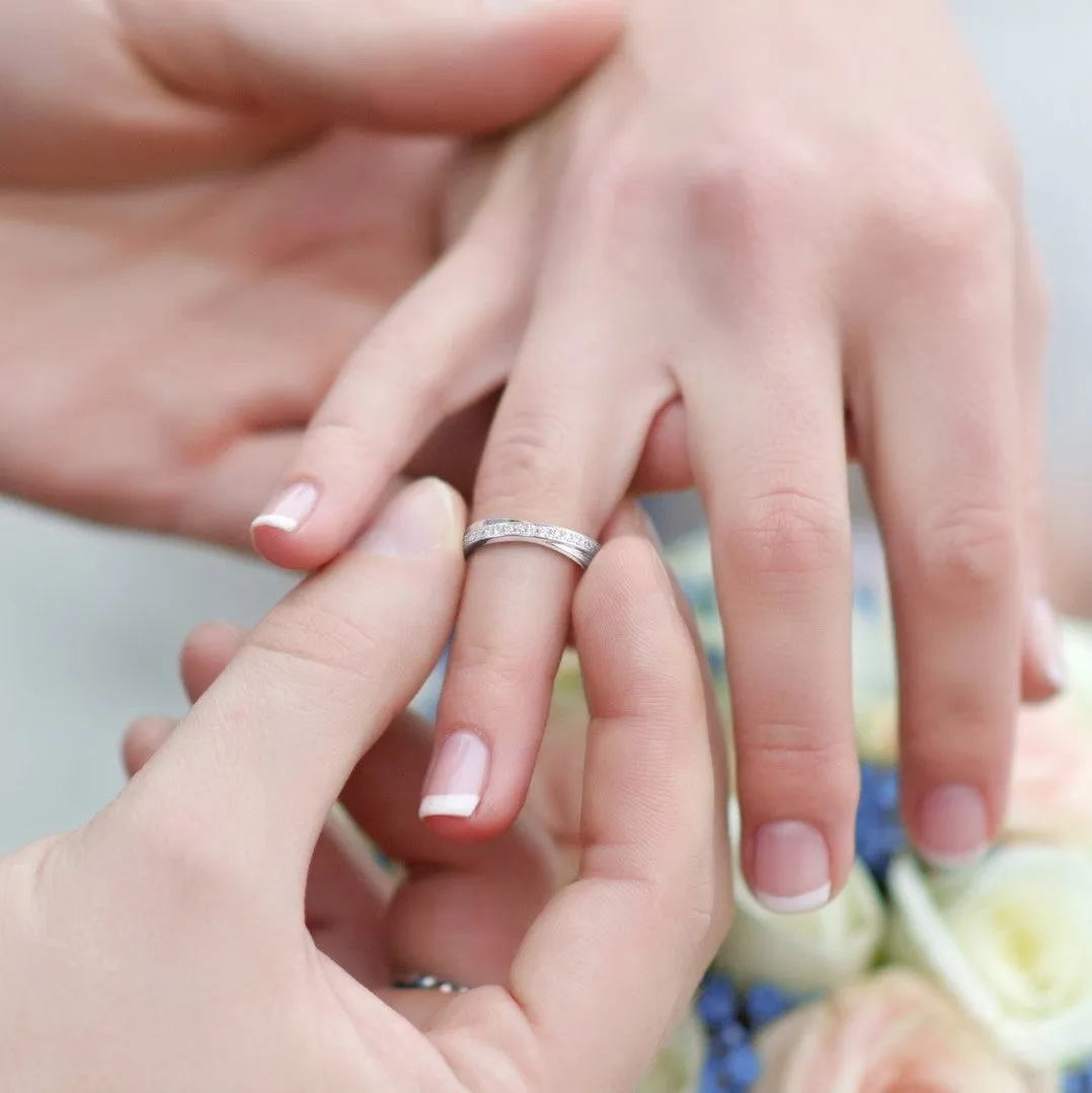 Couple Rings: Silver rhodium plated with 1.2 mm CZ criss cross band ring