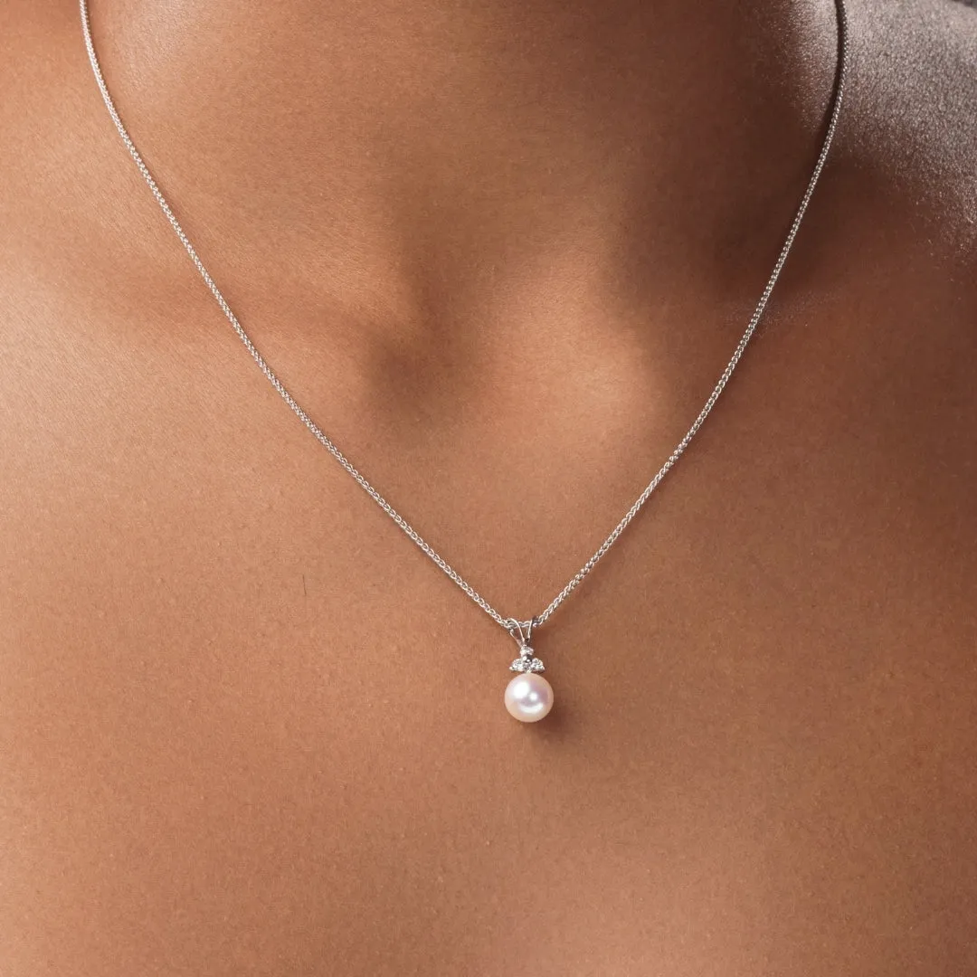 Cultered Pearl and Three Stone Emerald Pendant