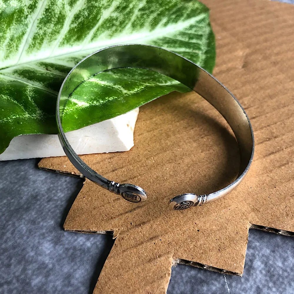 Ele Embossed Wrist Cuff